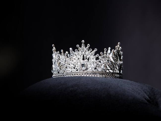 Diamond Silver Crown for Miss Pageant Beauty Contest, Crystal Tiara jewelry decorated gems stone and abstract dark background on black velvet fabric cloth, Macro photography copy space for text logo